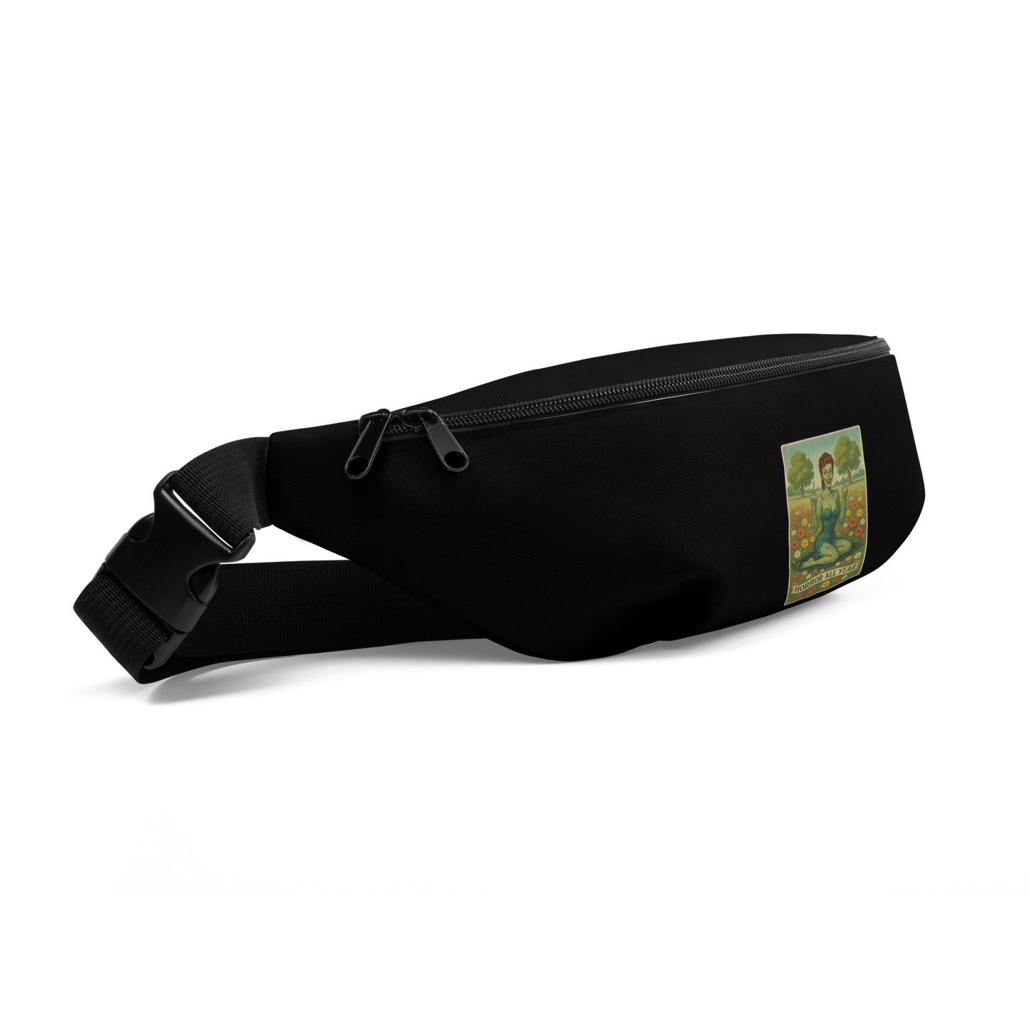 This is the side of a black waist bag fanny pack with a design illustration of a sassy zombie pinup girl standing in a floral field, wearing tattered lingerie and flipping off the viewer with both hands. She has green skin, vintage curls, and a bold attitude. The design blends horror and humor, with a pastel color palette and creepy cute vibes