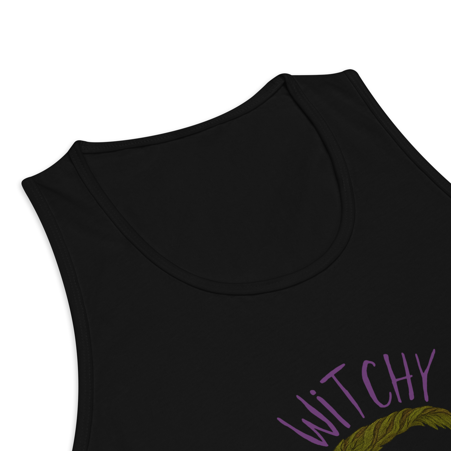 This is a zoom in of a black tank top with a design of a hand-drawn wreath made of moss-covered branches wraps around a glowing sun. The wreath is decorated with purple and blue flowers, small amethyst and fluorite crystals, and strands of hanging moss. The words “Witchy” curve above the wreath and “All Year” sits on the bottom right