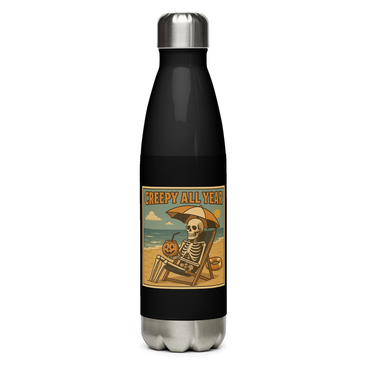 This is a black stainless steel water bottle with a retro-style illustration of a grinning skeleton lounging on a beach chair under an orange umbrella. The skeleton is holding a pumpkin-shaped drink cup with a straw and relaxing by the ocean, with a bright sun in the sky and a life preserver in the sand. The words “Creepy All Year” appear boldly at the top on the front side