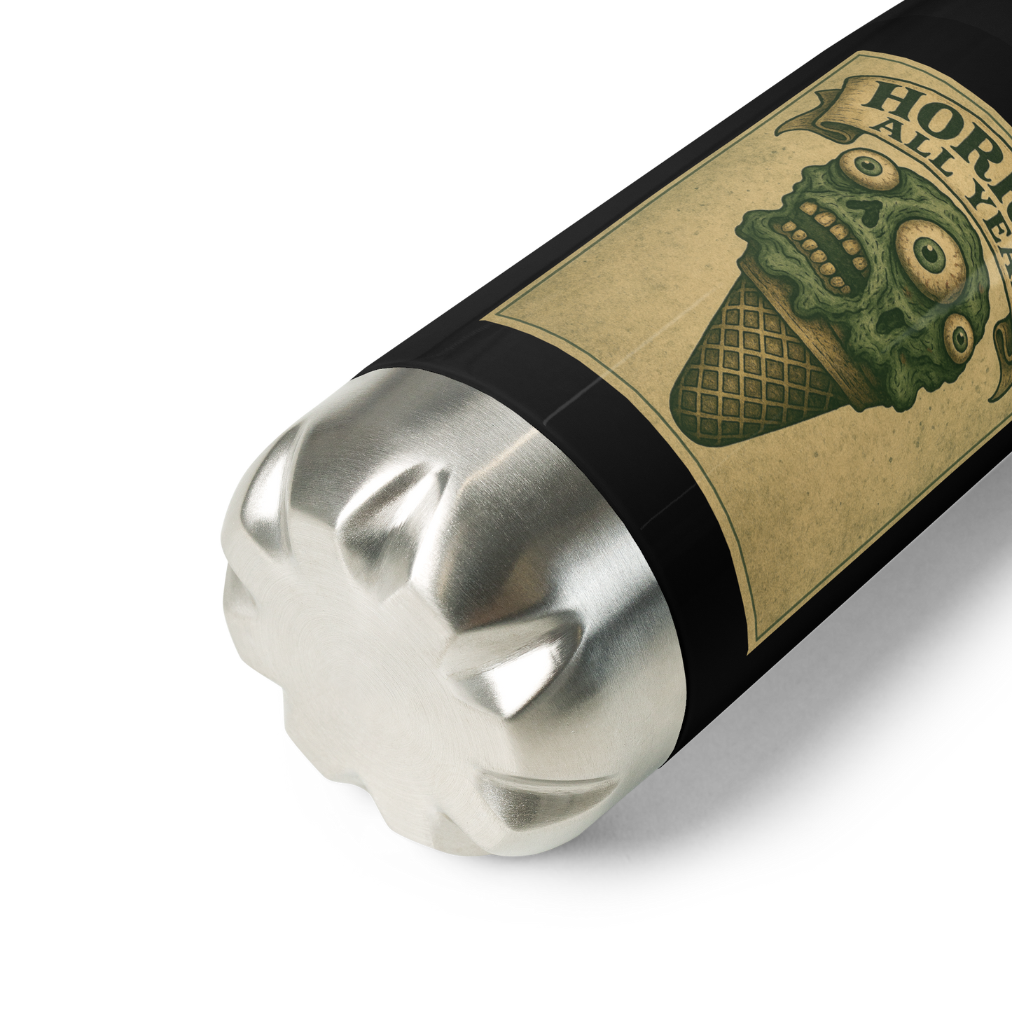 This is a zoom in of a black and stainless steel water bottle with a vintage-style illustration of a zombie-themed ice cream cone with a green, melting undead face and bulging eyeballs. Above the cone, a horror banner reads "Horror All Year" on a distressed parchment background