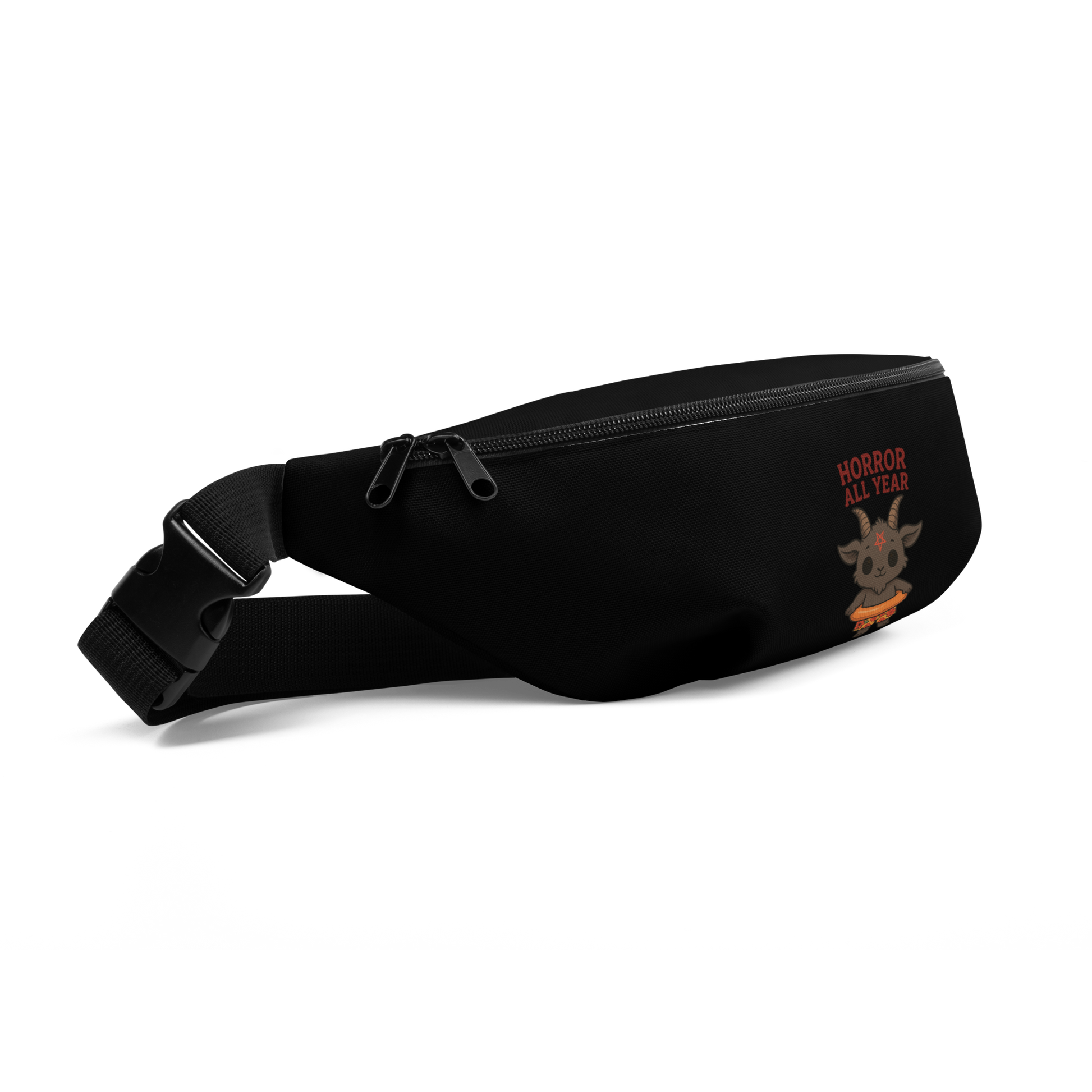 This is a side view of a black waist bag fanny pack that has a cartoon illustration of a baby Baphomet goat with curved horns and a playful grin, wearing bright floral swim trunks while floating in a colorful inner tube. The character is set against a light background with the bold text “Horror All Year” above in red letters 