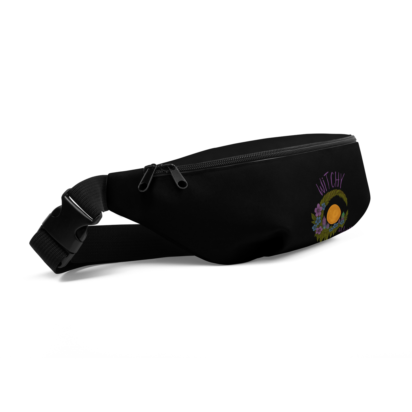 This is a black waist bag fanny pack with a design of a hand-drawn wreath made of moss-covered branches wraps around a glowing sun. The wreath is decorated with purple and blue flowers, small amethyst and fluorite crystals, and strands of hanging moss. The words “Witchy” curve above the wreath and “All Year” sits on the bottom right 