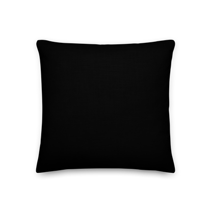 This is the back of a black throw pillow with a Día de los Muertos–style illustration of a male and female skeleton holding hands, surrounded by marigolds, vines, and folk art patterns. The skeletons wear traditional black clothing, the man in a suit and hat, the woman with a floral crown with a red heart and leaves at the bottom and the text Creepy All Year. Rendered in warm tones of orange, green, and cream, symbolizing eternal love and remembrance on the front side