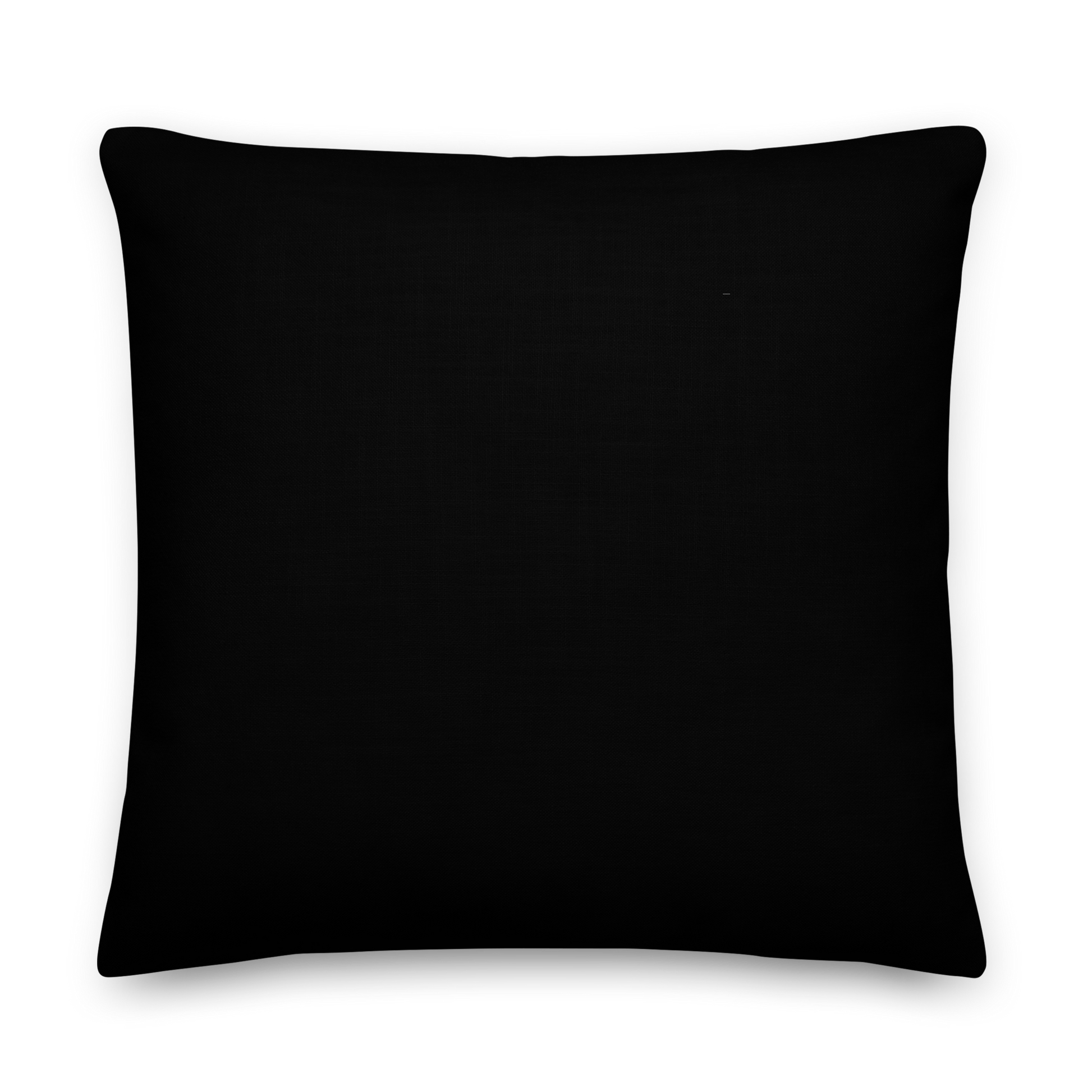 This is the back of a black throw pillow with a Día de los Muertos–style illustration of a male and female skeleton holding hands, surrounded by marigolds, vines, and folk art patterns. The skeletons wear traditional black clothing, the man in a suit and hat, the woman with a floral crown with a red heart and leaves at the bottom and the text Creepy All Year. Rendered in warm tones of orange, green, and cream, symbolizing eternal love and remembrance on the front side