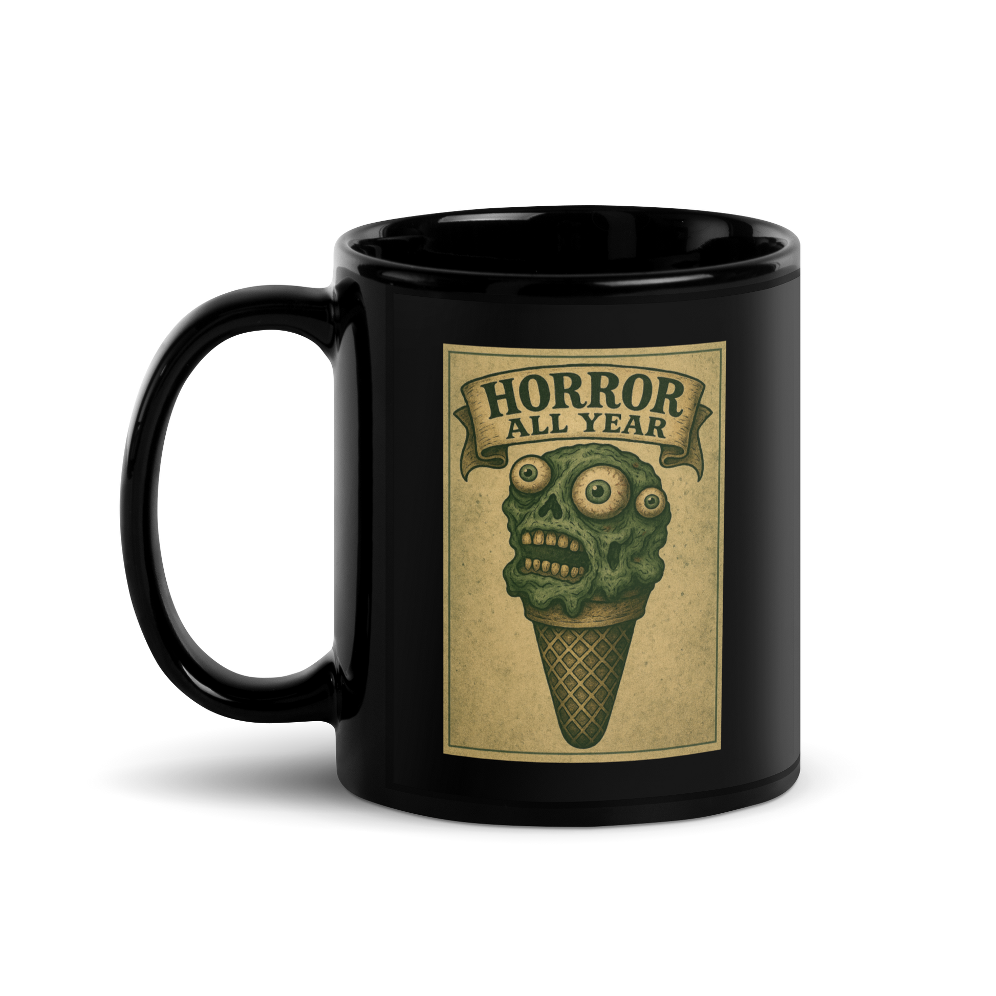 This is a black mug with a vintage-style illustration of a zombie-themed ice cream cone with a green, melting undead face and bulging eyeballs. Above the cone, a horror banner reads "Horror All Year" on a distressed parchment background