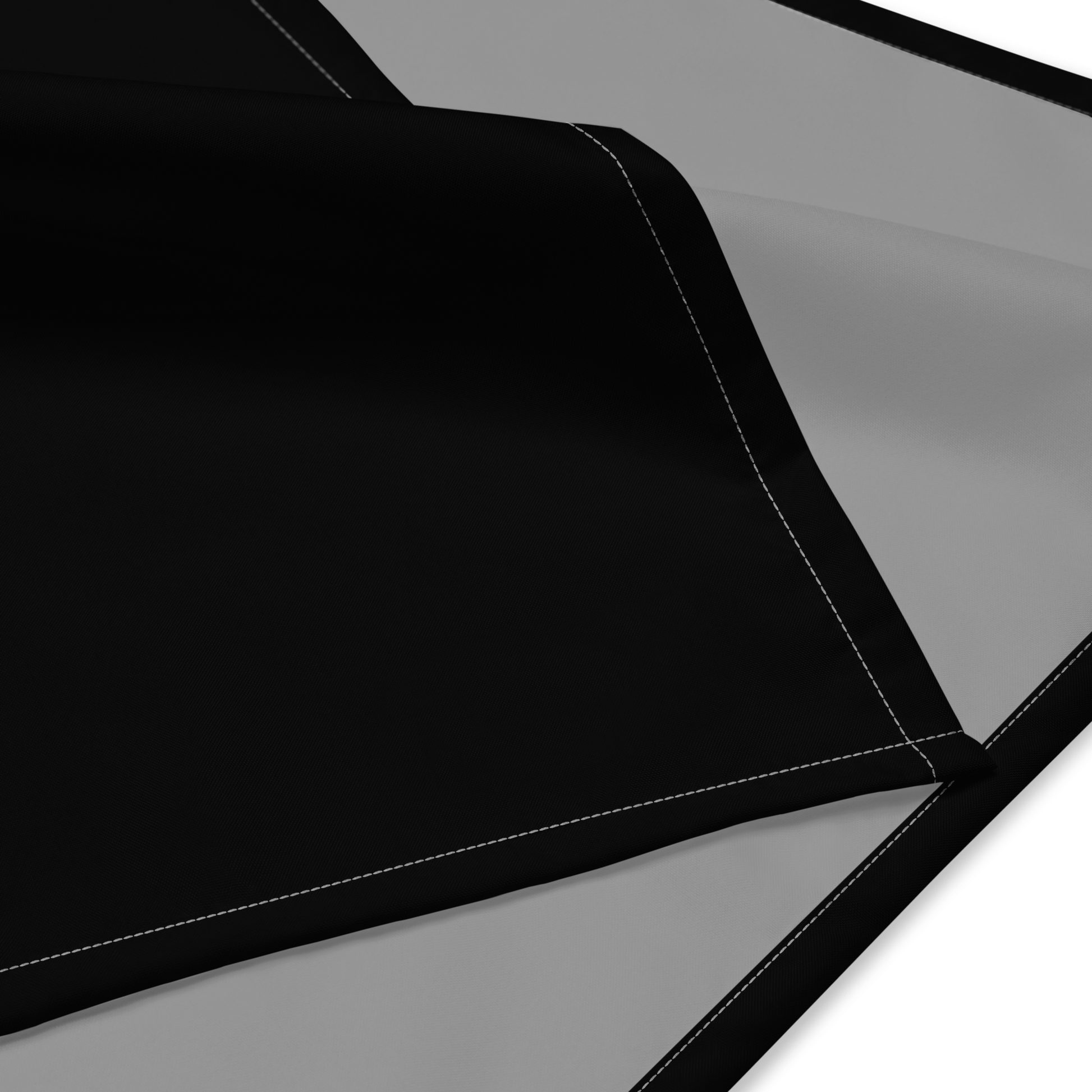 Black and gray fabric samples for a print on demand bandana