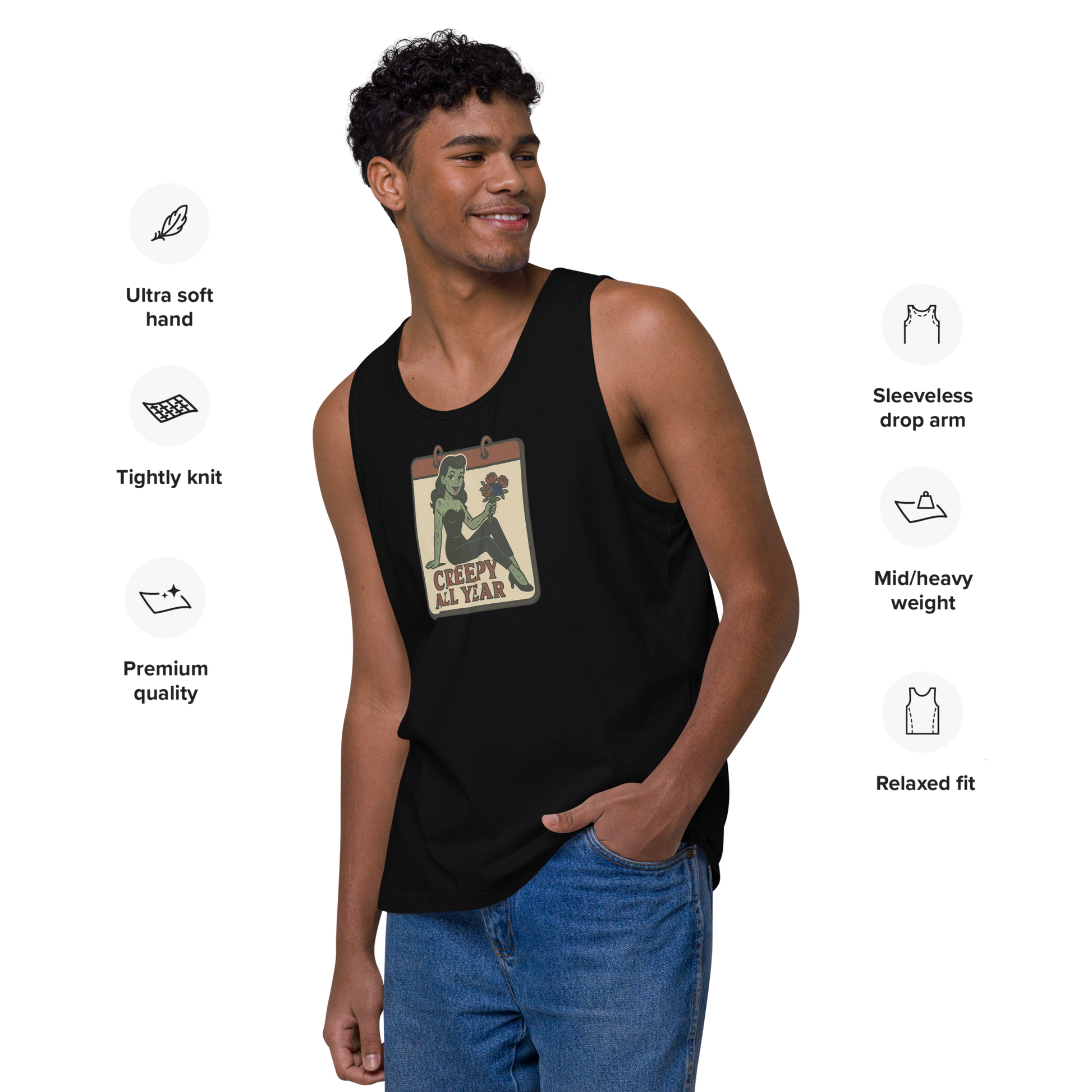 A black tank top on a man with black hair with a vintage-style design on the front and there are feature icons. The design features a green pinup-style zombie girl holding flowers, with a banner underneath that reads “CREEPY ALL YEAR.”