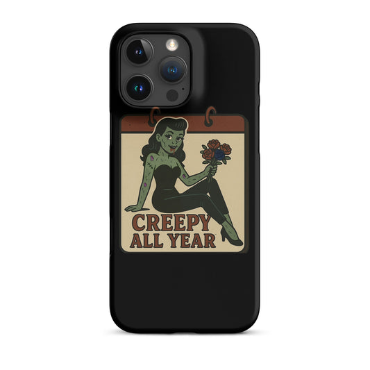 Snap iphone case with a graphic design. The design features a green pinup-style zombie girl holding flowers, with a banner underneath that reads “CREEPY ALL YEAR.”