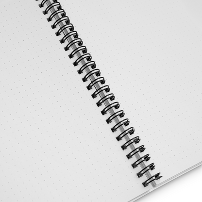 Spiral-bound notebook with white pages 