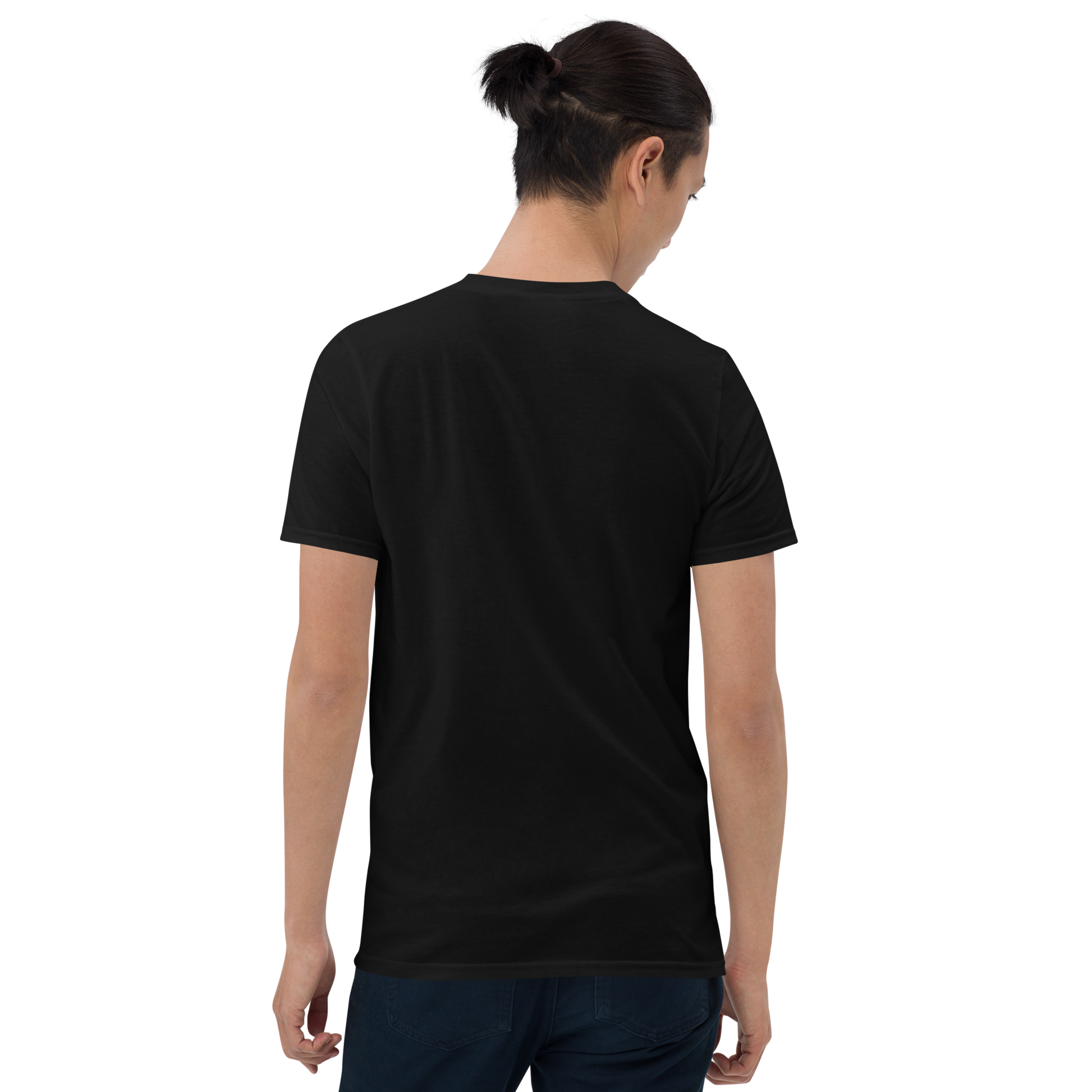 A man with black hair wearing jeans and t-shirt showing the back. The design on the front features a green pinup-style zombie girl holding flowers, with a banner underneath that reads “CREEPY ALL YEAR.”