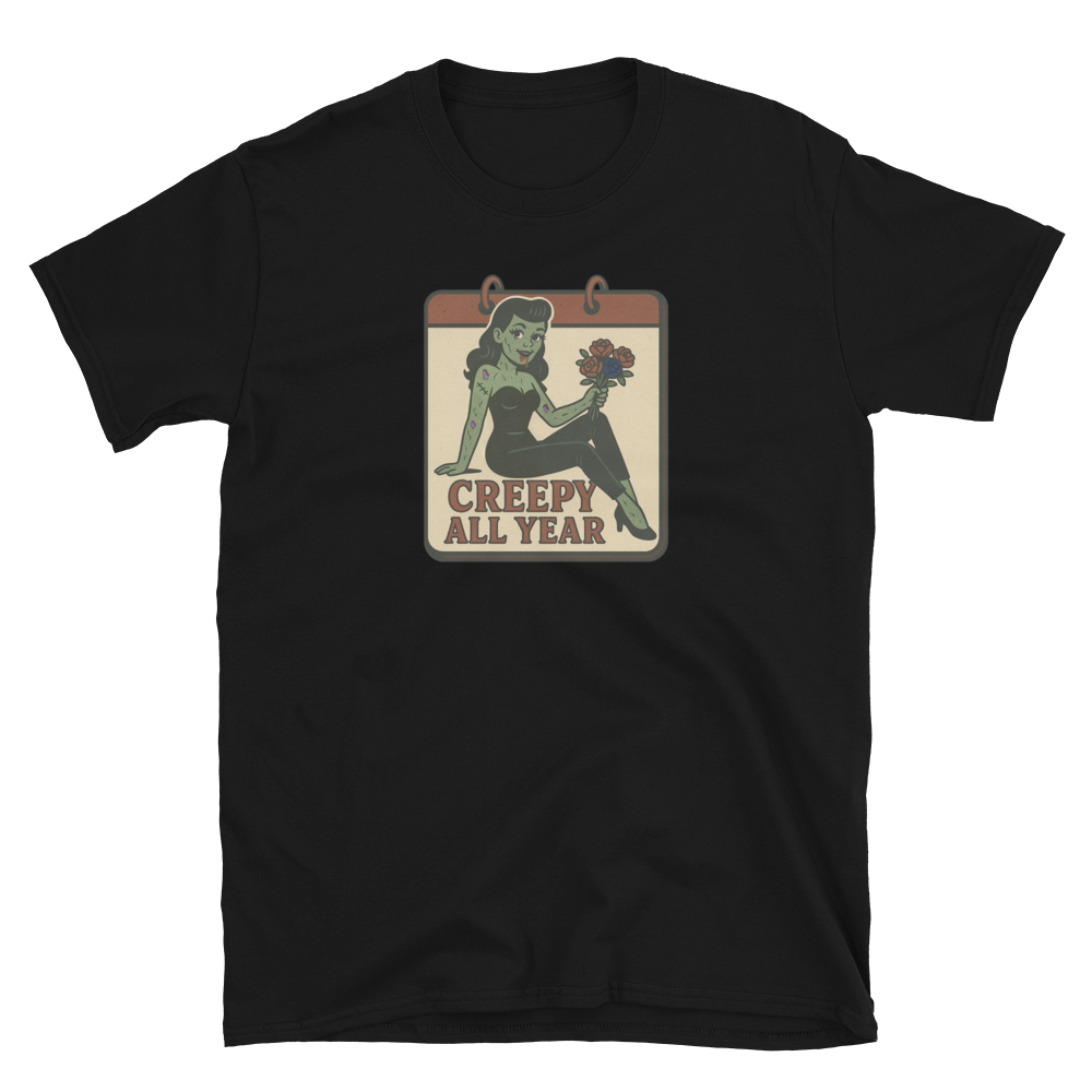 Black t-shirt with a graphic design of a pinup zombie holding a flower and text 'Creepy All Year' on the design.