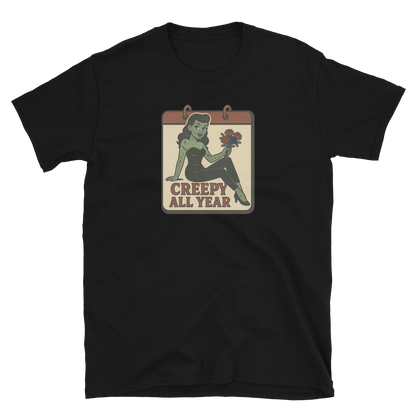 Black t-shirt with a graphic design of a pinup zombie holding a flower and text 'Creepy All Year' on the design.
