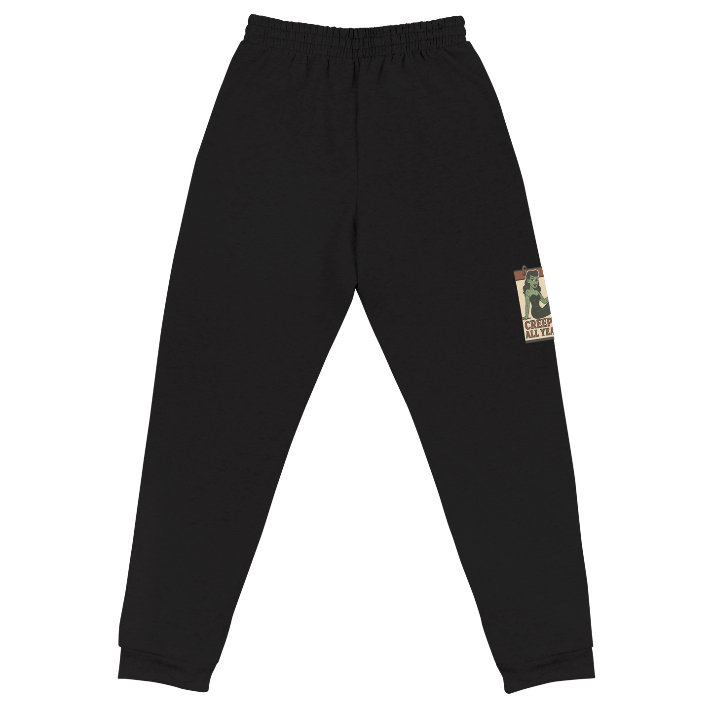 Back of black joggers with a vintage-style design on the front. The design features a green pinup-style zombie girl holding flowers, with a banner underneath that reads “CREEPY ALL YEAR.”