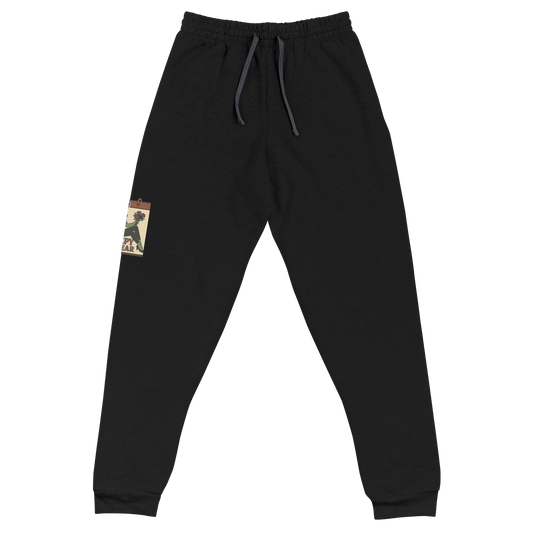 Black joggers with a vintage-style design on the front. The design features a green pinup-style zombie girl holding flowers, with a banner underneath that reads “CREEPY ALL YEAR.”