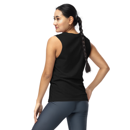 A girl with dark hair braided wearing leggings and muscle shirt showing the back. The design on the front features a green pinup-style zombie girl holding flowers, with a banner underneath that reads “CREEPY ALL YEAR.”