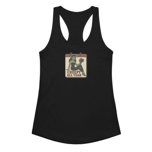A black tank top with a vintage-style design on the front. The design features a green pinup-style zombie girl holding flowers, with a banner underneath that reads “CREEPY ALL YEAR.”