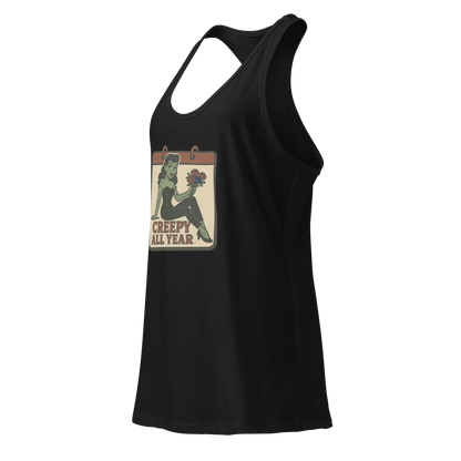 A black tank top side view with a vintage-style design on the front. The design features a green pinup-style zombie girl holding flowers, with a banner underneath that reads “CREEPY ALL YEAR.”