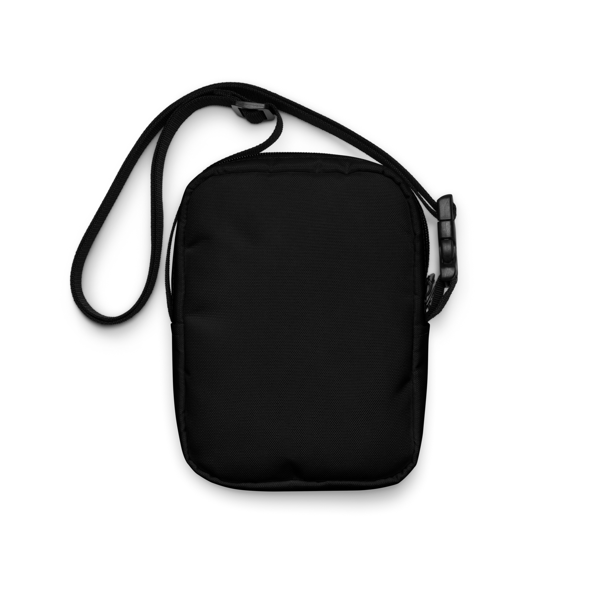 This is the back of a black crossbody bag that has a bored skeleton with his head resting in his hand and he has spider webs and bats around him and the text reads just waiting for October on the front