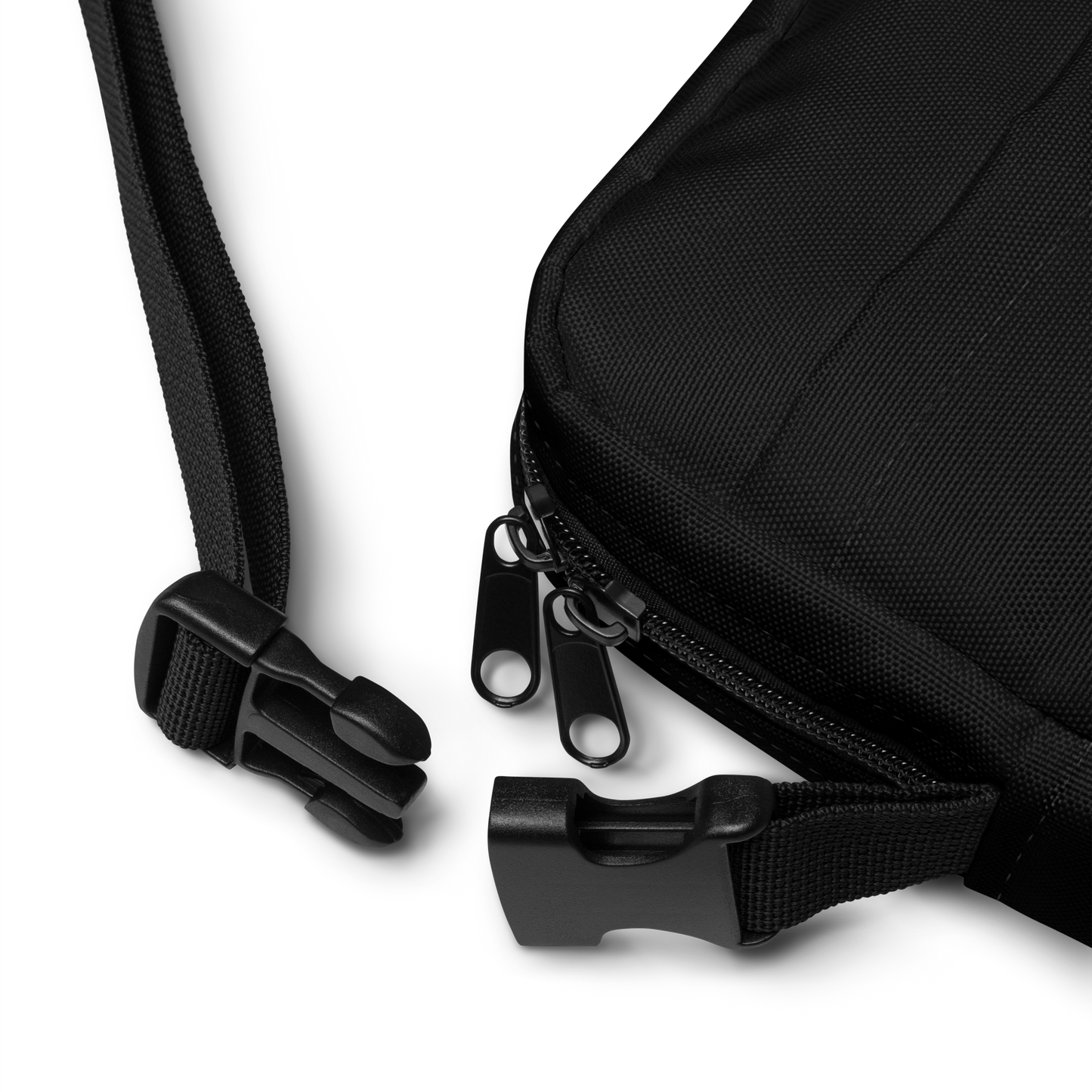 This is a black crossbody bag clasp that has a bored skeleton with his head resting in his hand and he has spider webs and bats around him and the text reads just waiting for October