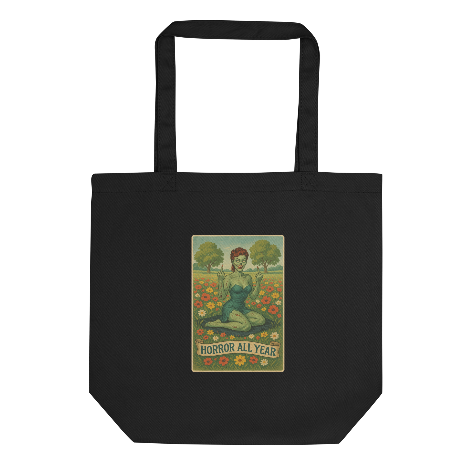 This is a black eco tote bag with a design illustration of a sassy zombie pinup girl standing in a floral field, wearing tattered lingerie and flipping off the viewer with both hands. She has green skin, vintage curls, and a bold attitude. The design blends horror and humor, with a pastel color palette and creepy cute vibes