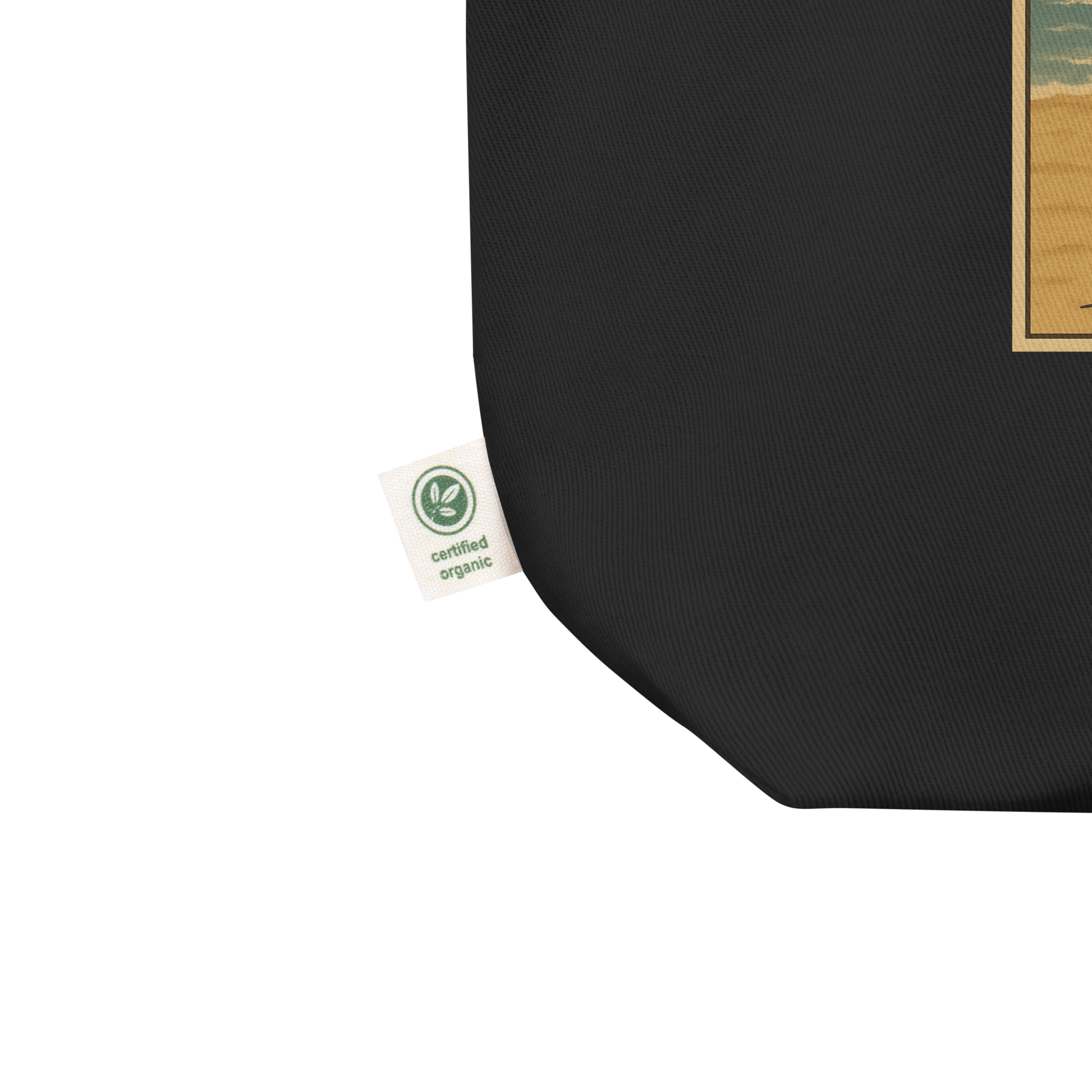This is an organic tag of an eco tote bag with a retro-style illustration of a grinning skeleton lounging on a beach chair under an orange umbrella. The skeleton is holding a pumpkin-shaped drink cup with a straw and relaxing by the ocean, with a bright sun in the sky and a life preserver in the sand. The words “Creepy All Year” appear boldly at the top 