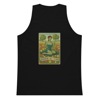 This is a black tank top with a design illustration of a sassy zombie pinup girl standing in a floral field, wearing tattered lingerie and flipping off the viewer with both hands. She has green skin, vintage curls, and a bold attitude. The design blends horror and humor, with a pastel color palette and creepy cute vibes