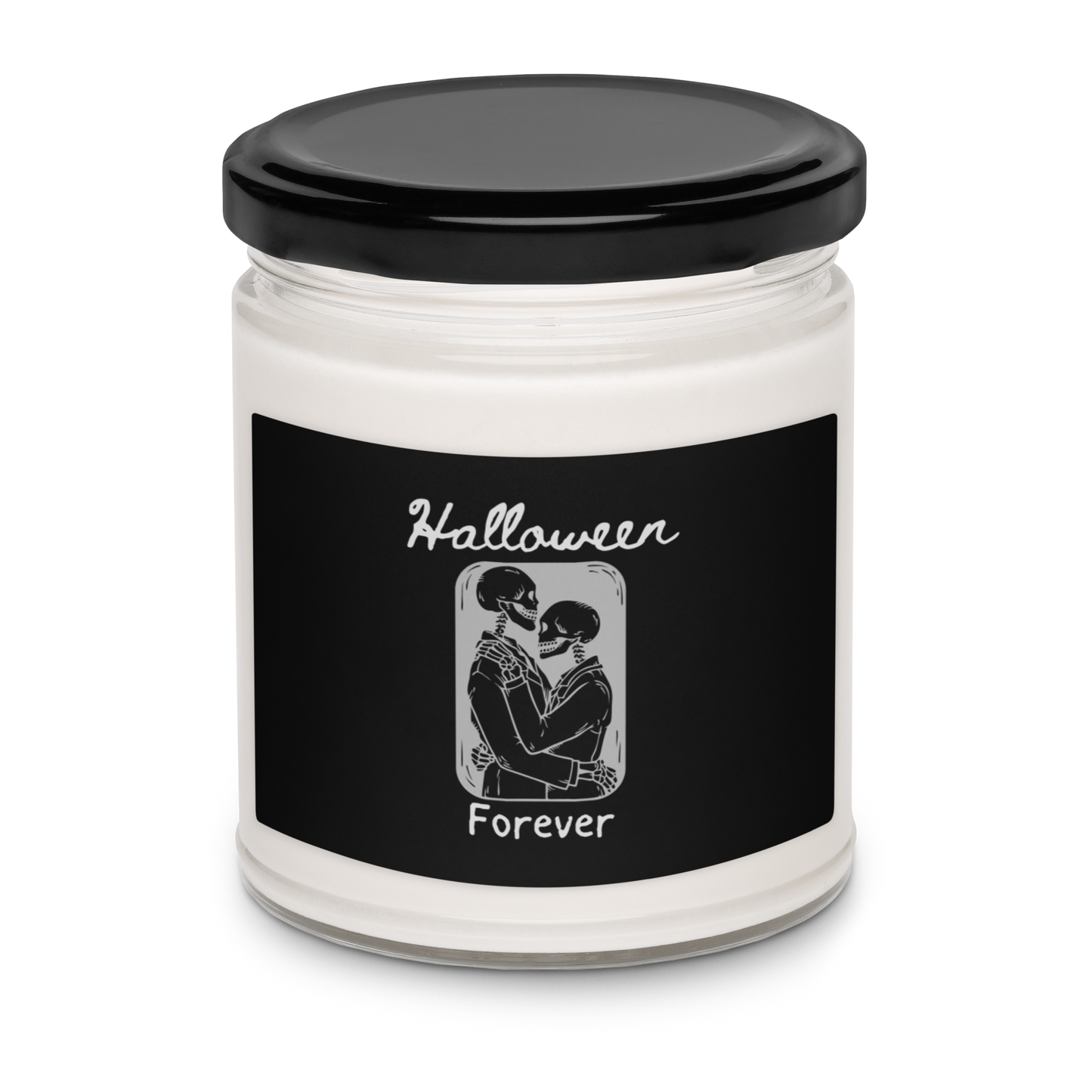 This is a candle with a black label that has a hugging skeleton couple that is grey and says Halloween Forever 