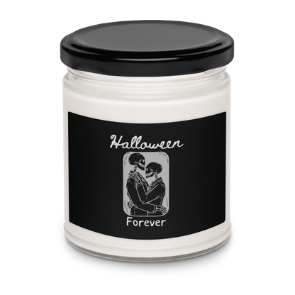 This is a candle with a black label that has a hugging skeleton couple that is grey and says Halloween Forever 