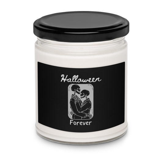 This is a candle with a black label that has a hugging skeleton couple that is grey and says Halloween Forever 