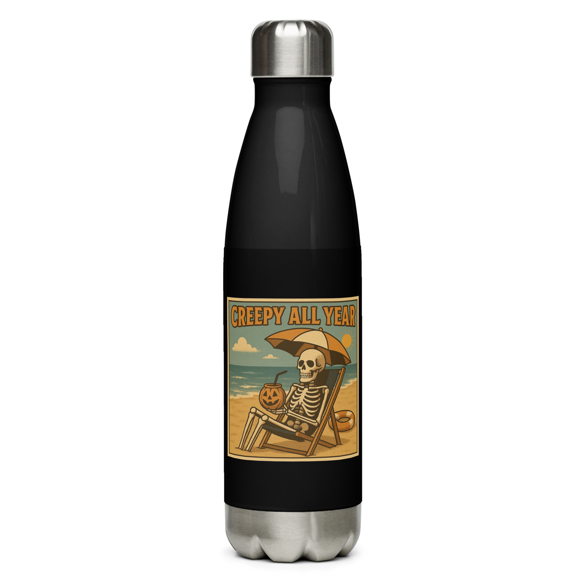 This is a black stainless steel water bottle with a retro-style illustration of a grinning skeleton lounging on a beach chair under an orange umbrella. The skeleton is holding a pumpkin-shaped drink cup with a straw and relaxing by the ocean, with a bright sun in the sky and a life preserver in the sand. The words “Creepy All Year” appear boldly at the top on the front side