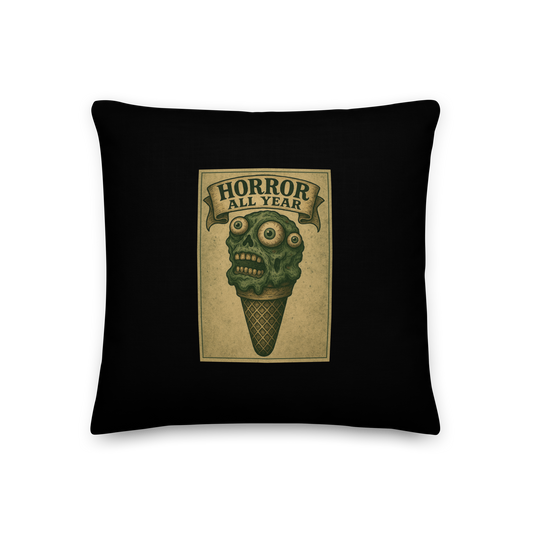 This is a pillow with a vintage-style illustration of a zombie-themed ice cream cone with a green, melting undead face and bulging eyeballs. Above the cone, a horror banner reads "Horror All Year" on a distressed parchment background