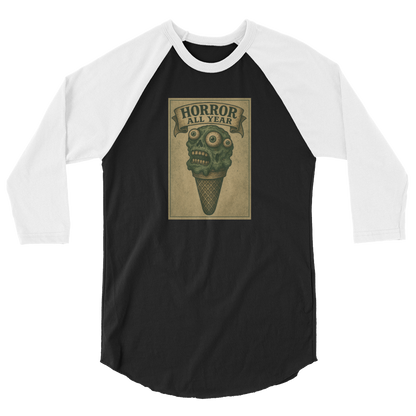 This is a black and white raglan shirt that is a vintage-style illustration of a zombie-themed ice cream cone with a green, melting undead face and bulging eyeballs. Above the cone, a horror banner reads "Horror All Year" on a distressed parchment background