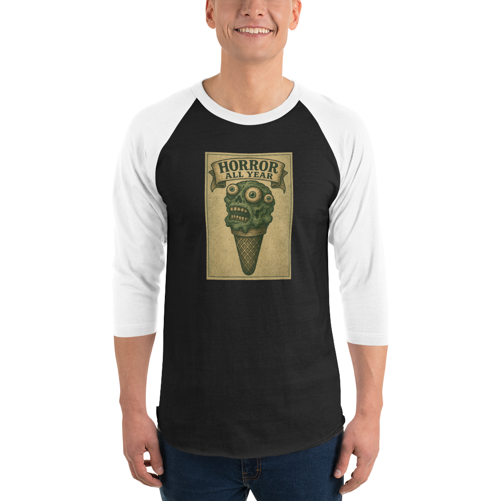 This is a man wearing jeans and a black and white raglan shirt that is a vintage-style illustration of a zombie-themed ice cream cone with a green, melting undead face and bulging eyeballs. Above the cone, a horror banner reads "Horror All Year" on a distressed parchment background