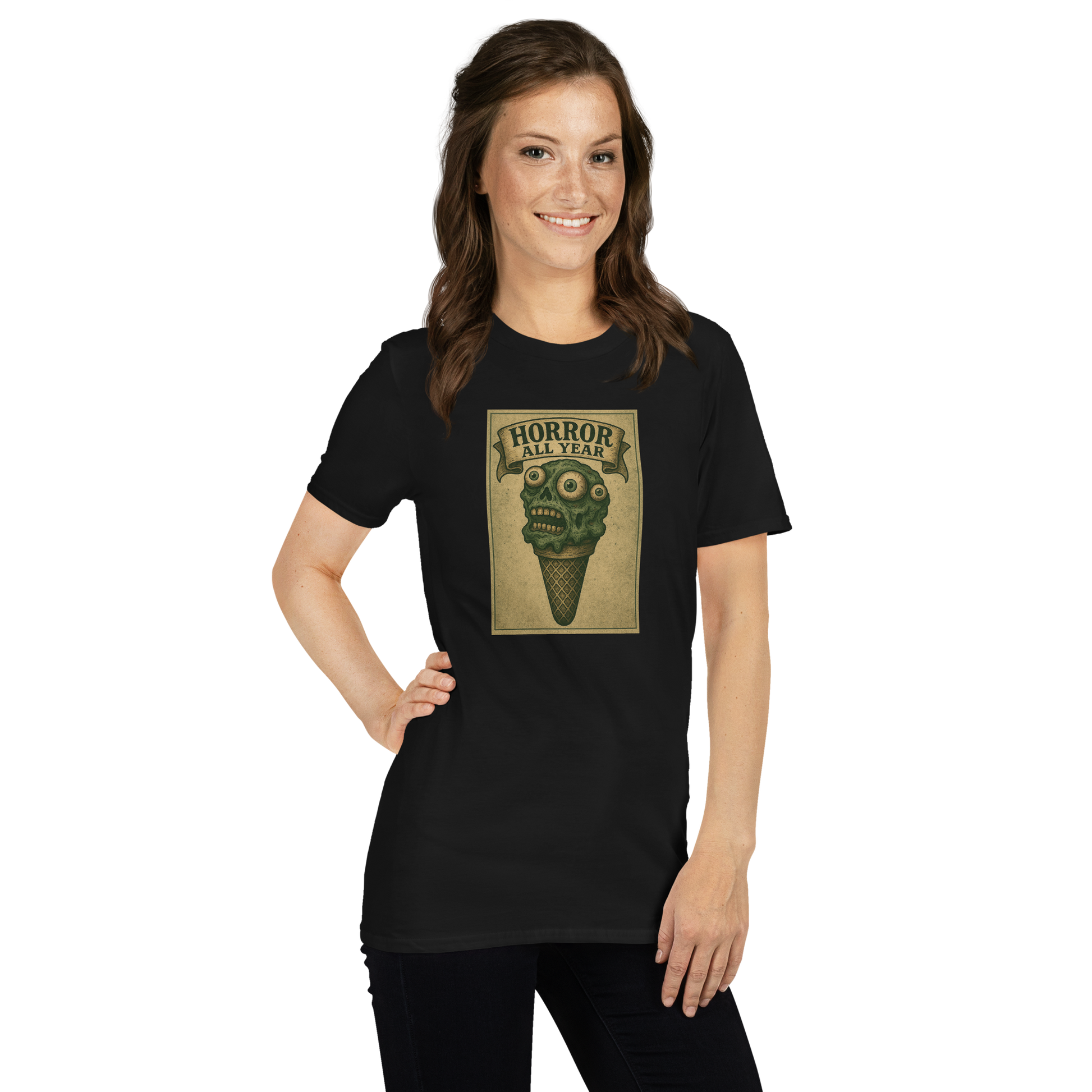 This is a woman with brown hair wearing a black t-shirt that is a vintage-style illustration of a zombie-themed ice cream cone with a green, melting undead face and bulging eyeballs. Above the cone, a horror banner reads "Horror All Year" on a distressed parchment background
