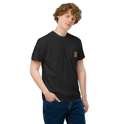 This is a man with curly hair wearing a black pocket t-shirt that is a vintage-style illustration of a zombie-themed ice cream cone with a green, melting undead face and bulging eyeballs. Above the cone, a horror banner reads "Horror All Year" on a distressed parchment background