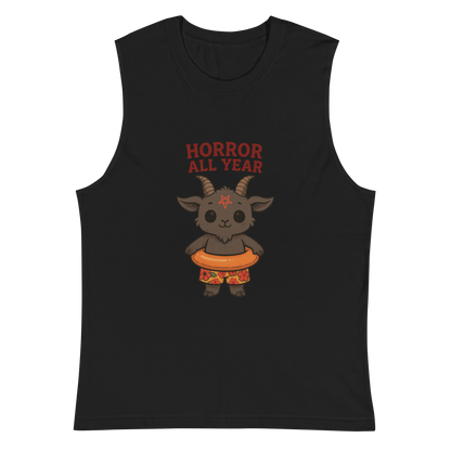 This is a black muscle shirt with a cartoon illustration of a baby Baphomet goat with curved horns and a playful grin, wearing bright floral swim trunks while floating in a colorful inner tube. The character is set against a light background with the bold text “Horror All Year” above in red letters