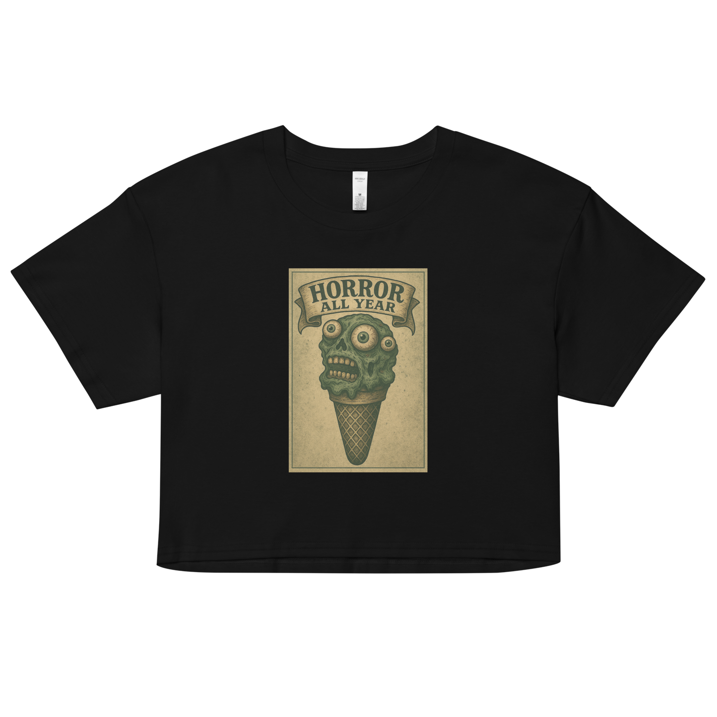 This a black crop top that is a vintage-style illustration of a zombie-themed ice cream cone with a green, melting undead face and bulging eyeballs. Above the cone, a horror banner reads "Horror All Year" on a distressed parchment background