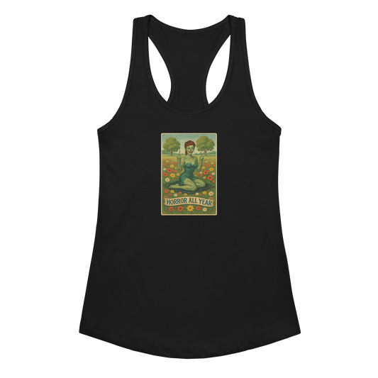 This is a black racerback tank top with a design illustration of a sassy zombie pinup girl standing in a floral field, wearing tattered lingerie and flipping off the viewer with both hands. She has green skin, vintage curls, and a bold attitude. The design blends horror and humor, with a pastel color palette and creepy cute vibes