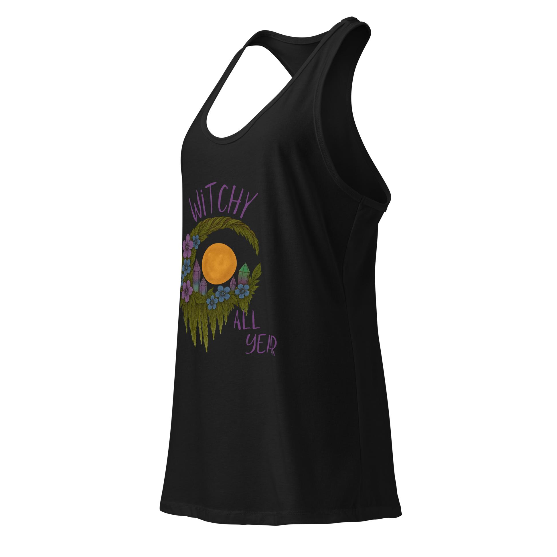 This is the side of a black racerback tank top with a design of a hand-drawn wreath made of moss-covered branches wraps around a glowing sun. The wreath is decorated with purple and blue flowers, small amethyst and fluorite crystals, and strands of hanging moss. The words “Witchy” curve above the wreath and “All Year” sits on the bottom right 
